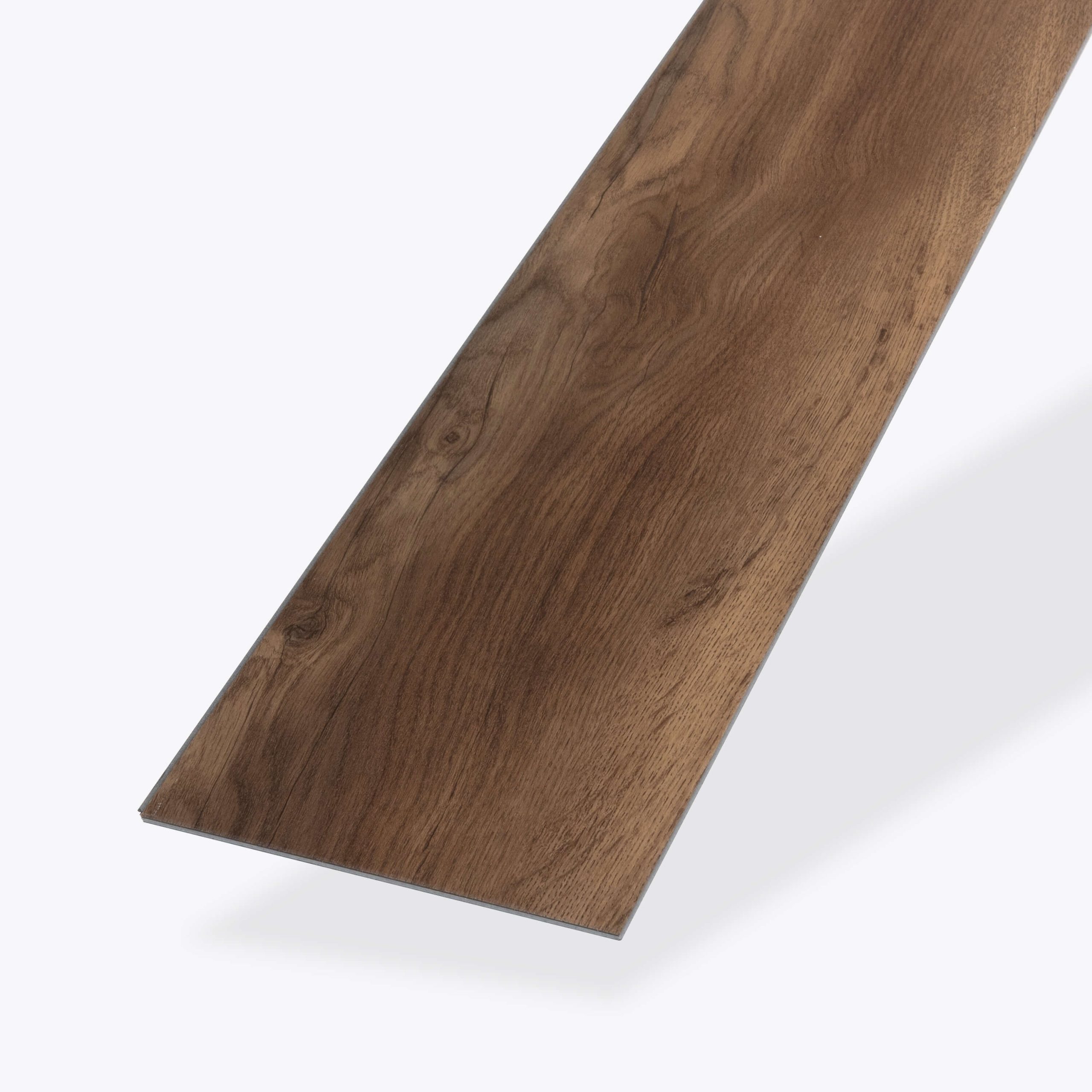 A single Larose* rectangular plank of wood-look vinyl flooring in warm brown, displayed on a light background, featuring natural wood grain texture and subtle knots.